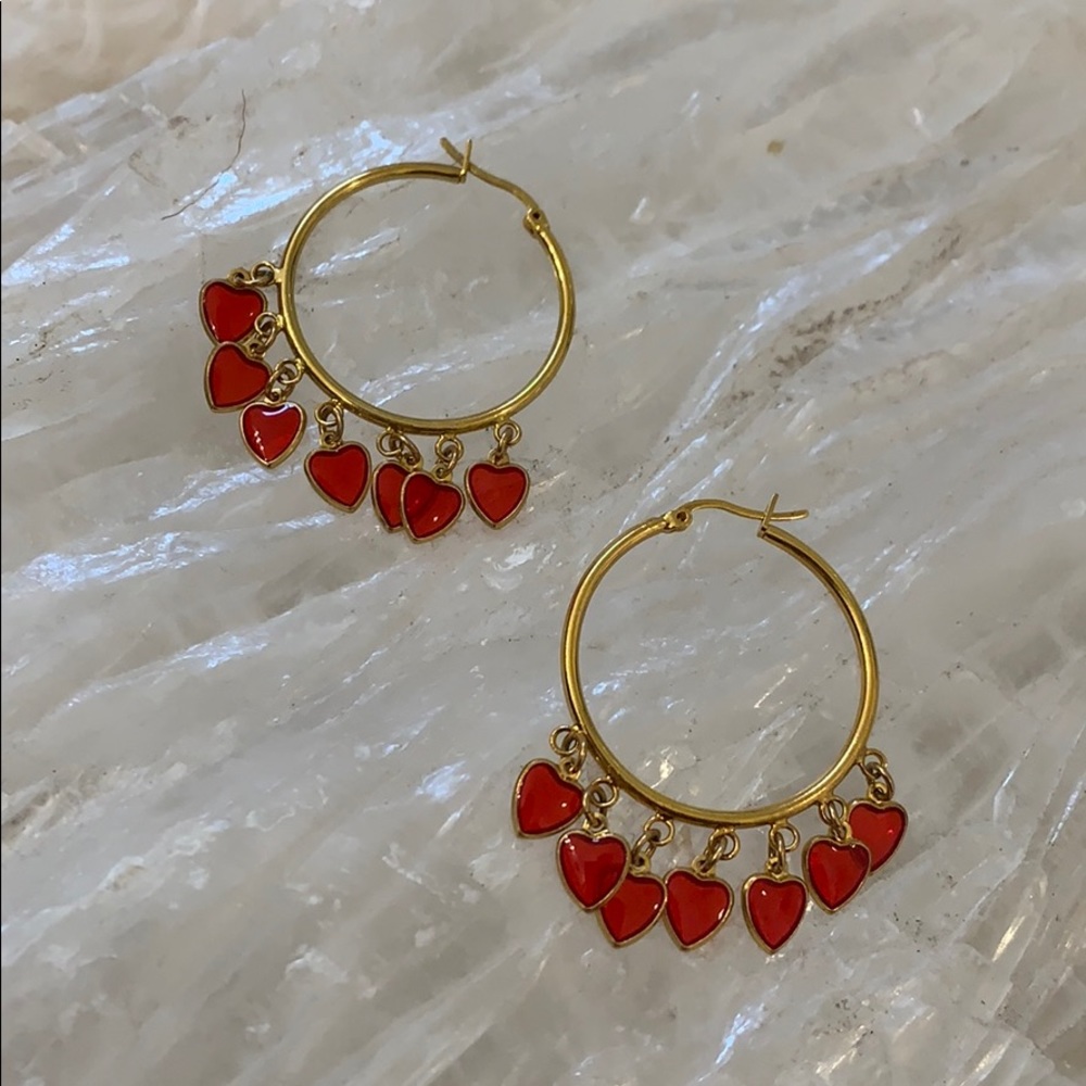 Gold hoops with heart charms